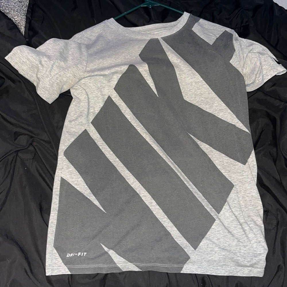 4 Nike shirts